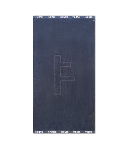 FORMER MERCHANDISE F LUX BEACH TOWEL BLACK